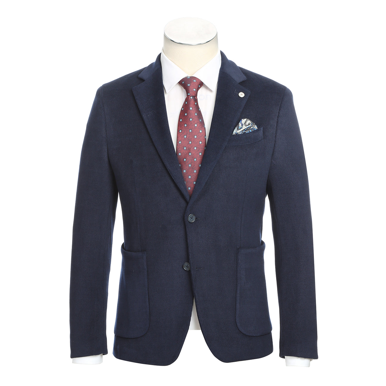The Pellagio Navy Blue Men's Half Canvas Blazer (PF24-9), featuring a slim fit, single-breasted design, two buttons, and notched lapel, is paired with a crisp white shirt and red polka dot tie. It includes two front pockets and a stylish patterned pocket square.