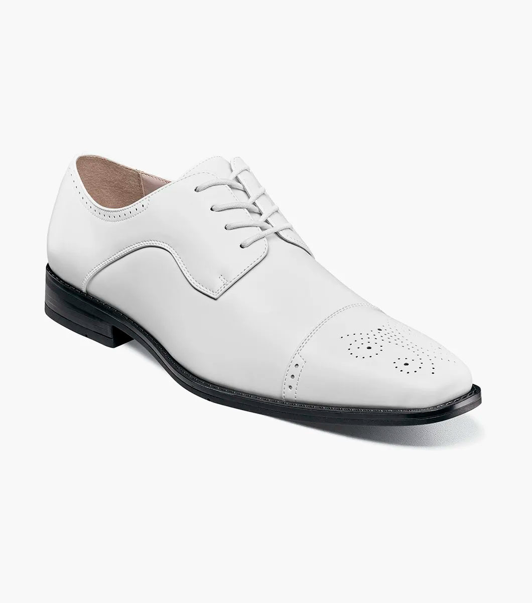 The STACY ADAMS Kenway Cap Toe Oxford (20194-100) is a white leather dress shoe with laces, a black sole, and decorative toe perforations.