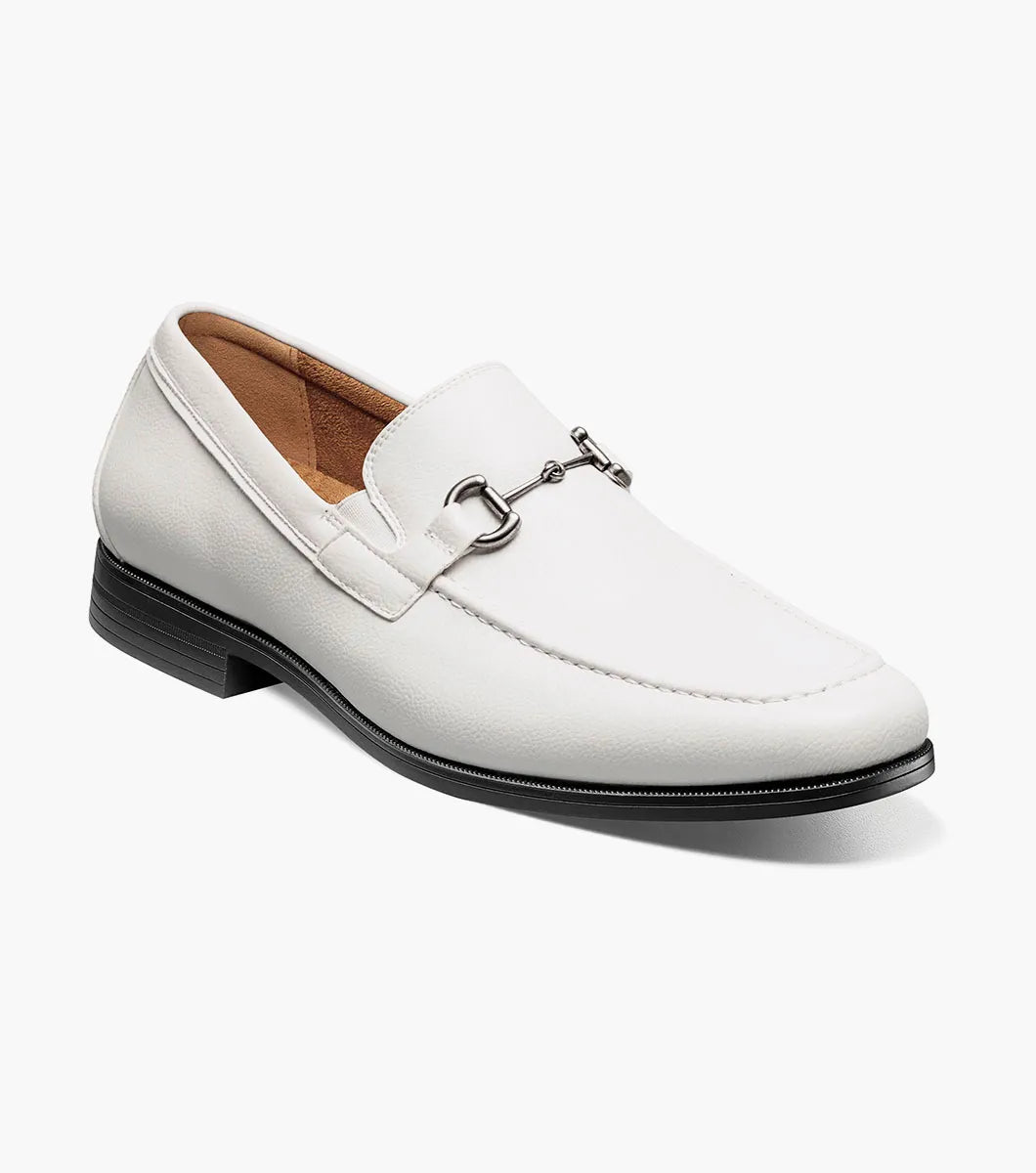 Step up your style with the STACY ADAMS Richmont Moc Toe Bit Slip On in White Tumbled (21567-117), featuring a sleek silver bit, black sole, and tan lining—classic leather loafers perfect for any dress occasion. Displayed on a white background.