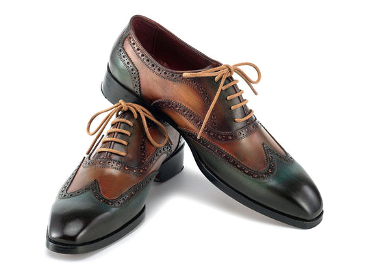 The Paul Parkman Wingtip Oxfords Green Handpainted Calfskin - 228-GRN feature brown and green hand-painted leather with brogue detailing and tan laces, shown on a white background.
