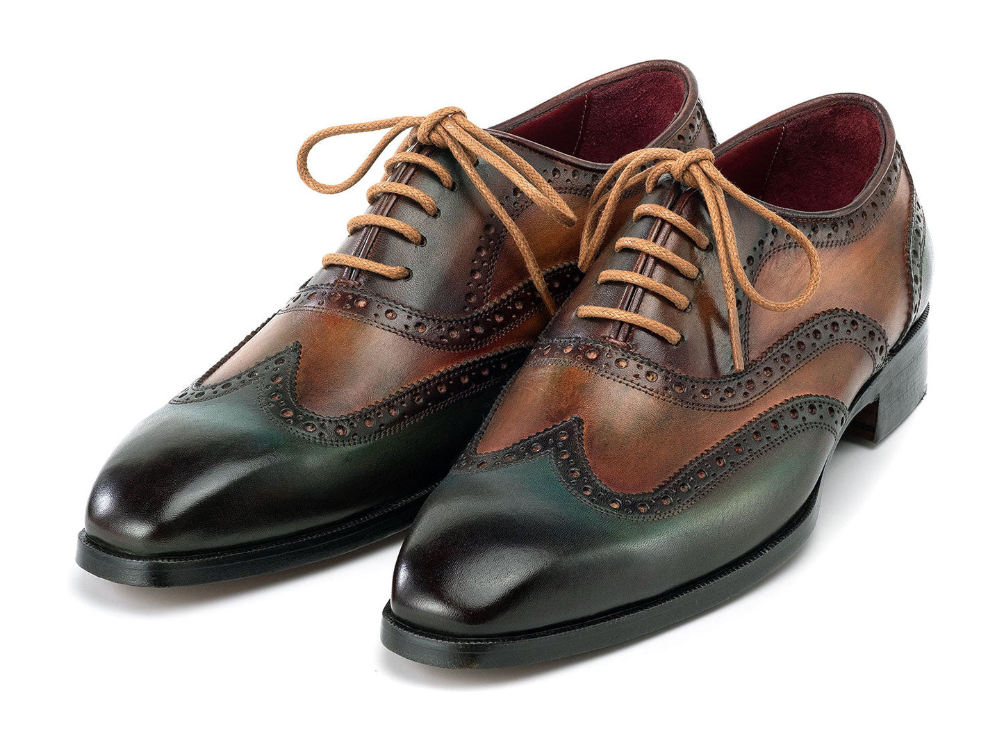 The Paul Parkman Wingtip Oxfords Green Handpainted Calfskin - 228-GRN feature brown and green hand-painted leather with brogue detailing and tan laces, shown on a white background.