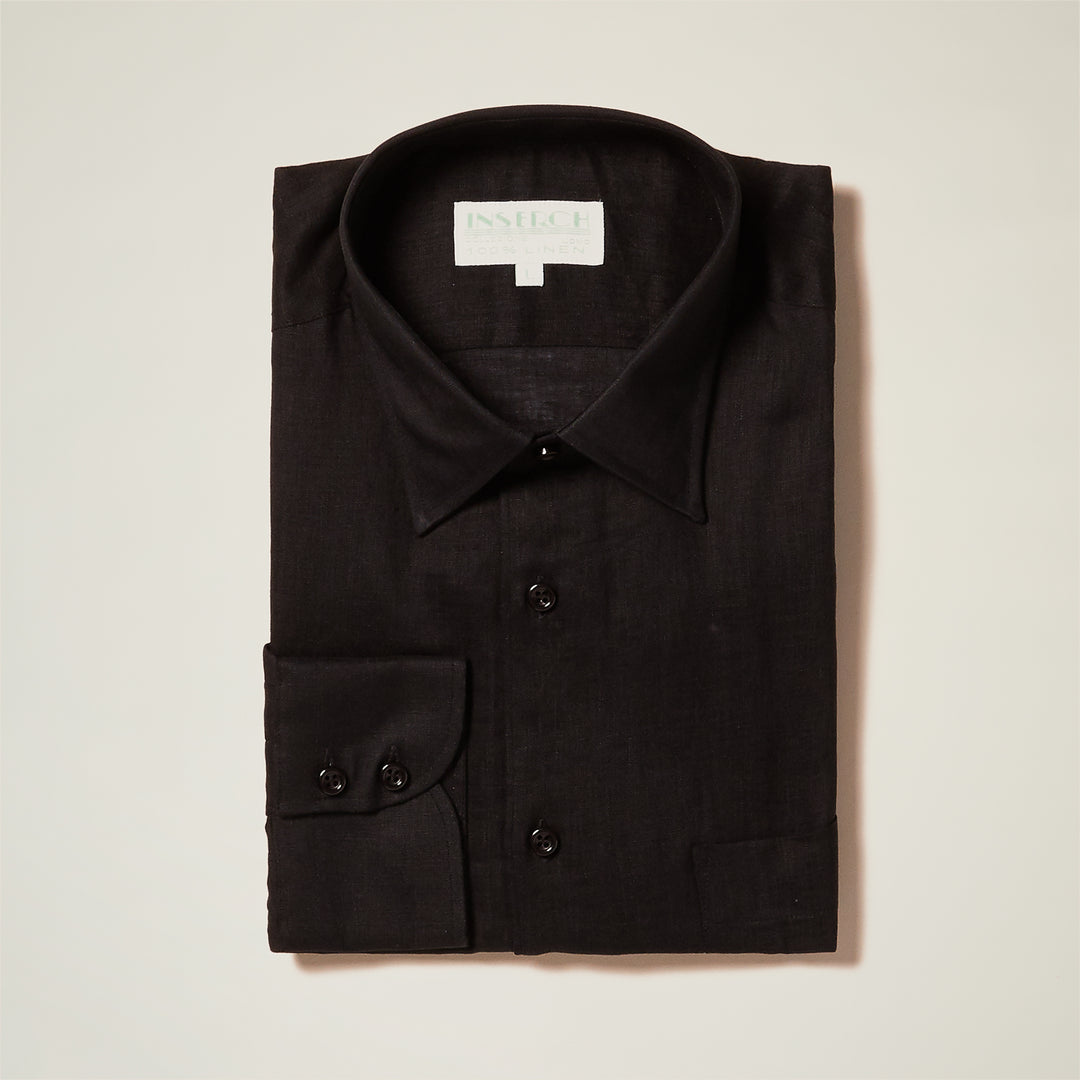 The Inserch 100% Premium European Flax Linen Long-Sleeve Shirt 24116-00001 Black, by Inserch, is neatly folded with a pointed collar and shown against a plain light background.