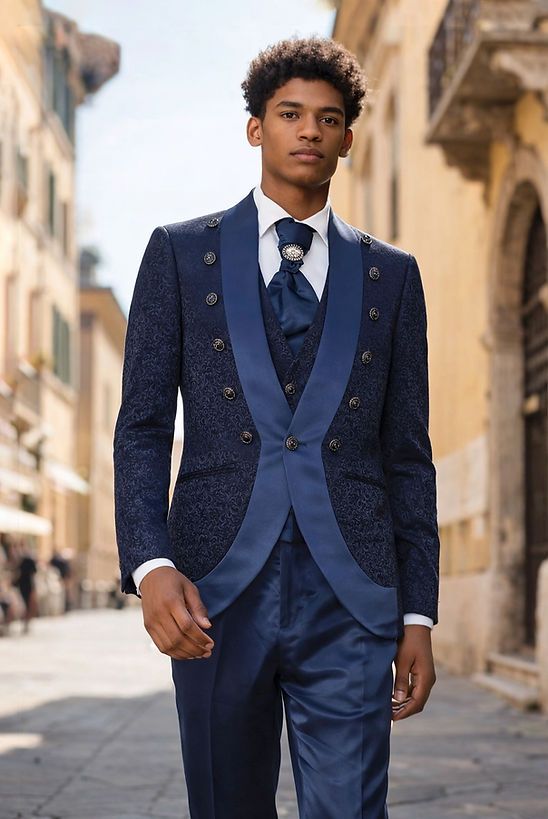 A man in a Manzini MIDLAND 3-piece slim-fit vintage tuxedo with satin trim in Midnight stands on a sunlit European street.