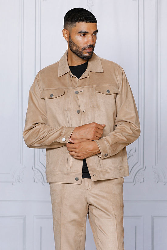 Close-up of a person in the Insomnia INSOMNIA ROMEO 2PC Khaki Vegan Suede Leisure Suit, featuring visible buttons and a chest flap pocket—ideal for casual wear.
