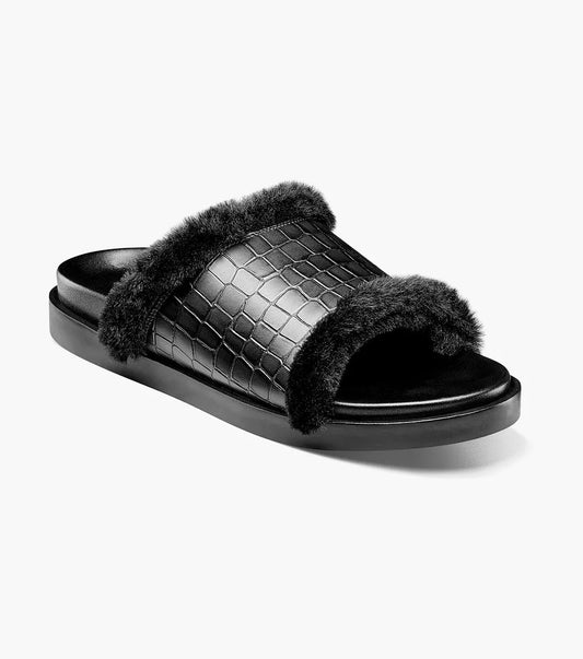 The Stacy Adams Monty Slide Sandal in black features a crocodile print faux leather upper, black faux fur trim, and an open toe on a flat sole.
