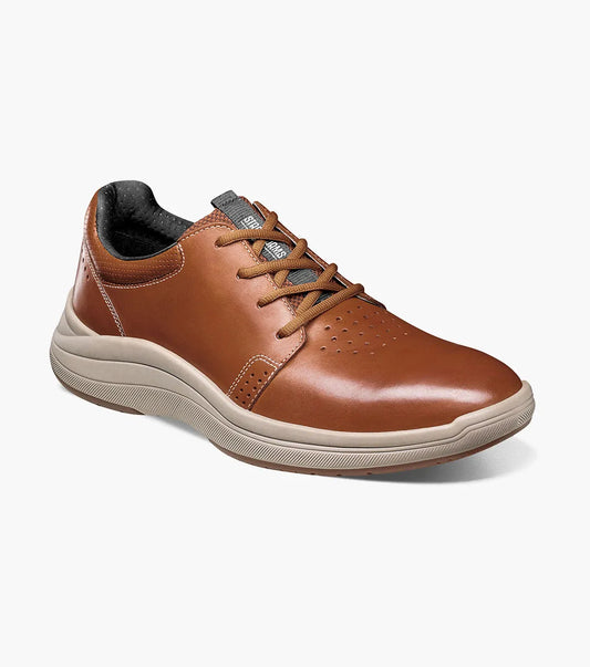 The STACY ADAMS Lennox Plain Toe Lace Up in Cognac Smooth has a beige rubber sole, black lining, perforated toe detail, and a cushioned RedZone footbed for comfort. Style number: 25573-225.