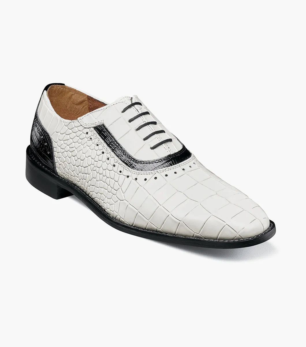 The STACY ADAMS Riccardi Plain Toe Oxford (Black w/White, 25575-111) features a croco lizard print leather texture, black accents on the sides and toe, and black laces, shown on a plain background.