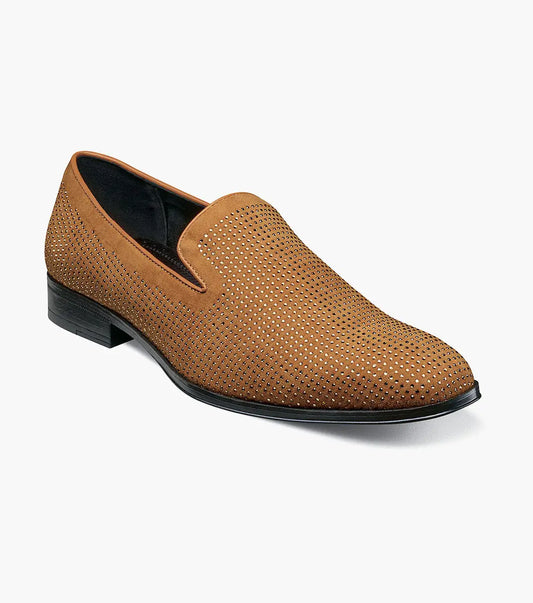STACY ADAMS Suave Rhinestone Slip On in Tan (25583-240) is a suede dress shoe loafer with perforated detail, black sole, low heel, and cushioned memory foam footbed, shown on a white background.