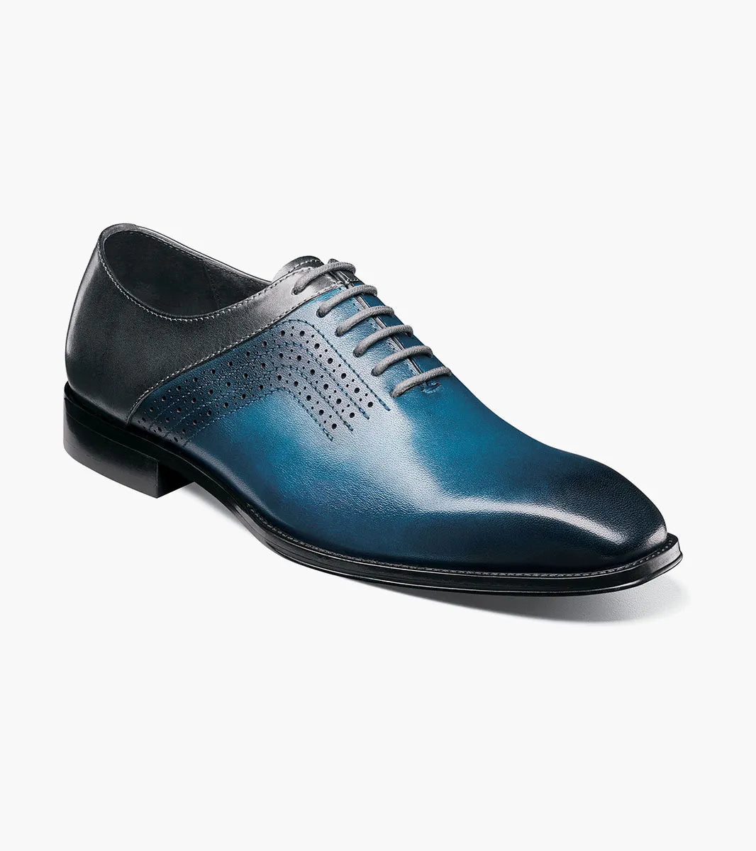 A single STACY ADAMS Halloway Plain Toe Oxford in Blue Multi (25585-419) is displayed on a white background, featuring perforated detailing, laces, and a low black heel.