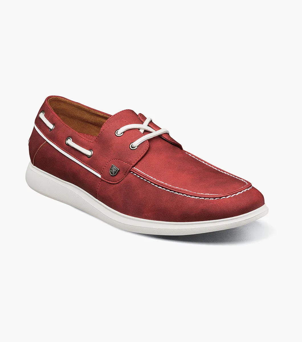 The STACY ADAMS Reid Moc Toe Lace Up (Red, 25592-600) is a red boat shoe with white stitching, laces, and sole, plus a memory foam footbed for comfort. Displayed on a plain white background.