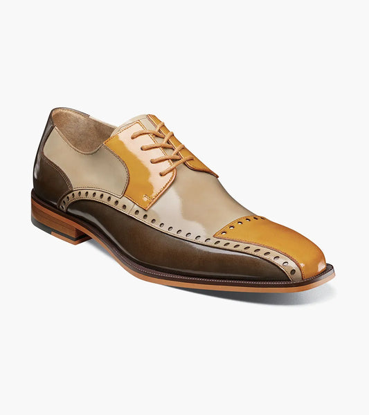 The STACY ADAMS Plaza Modified Cap Toe Oxford (25608-302) in Olive Multi features a leather upper with color-block design, brogue details, Memory Foam insole, and a low wooden heel for men's dress style and comfort.