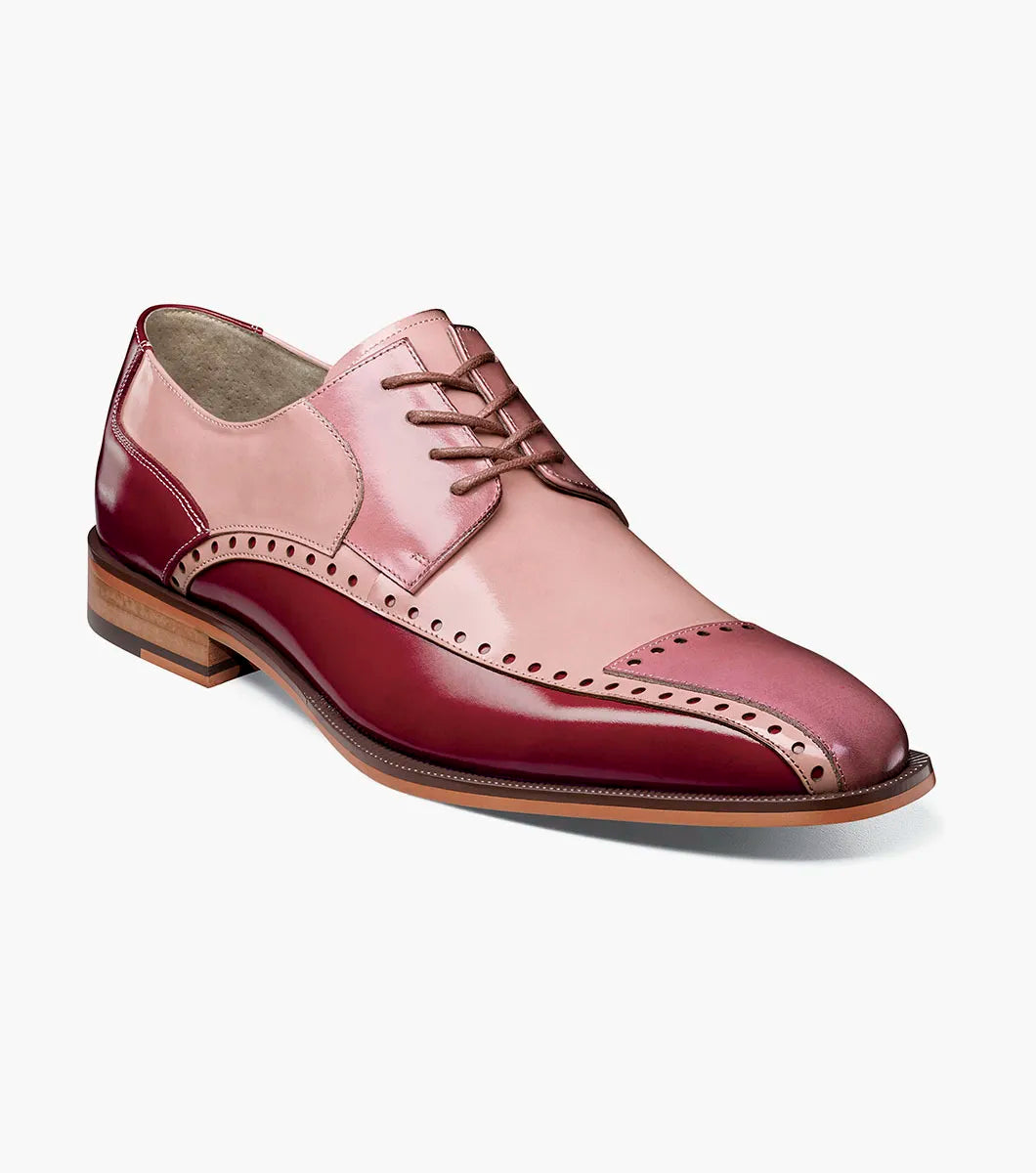 The Stacy Adams Plaza Modified Cap Toe Oxford (25608-640) features a red multi leather upper with brogue details, lace-up front, and brown stacked heel. Shown in side profile on a white background.
