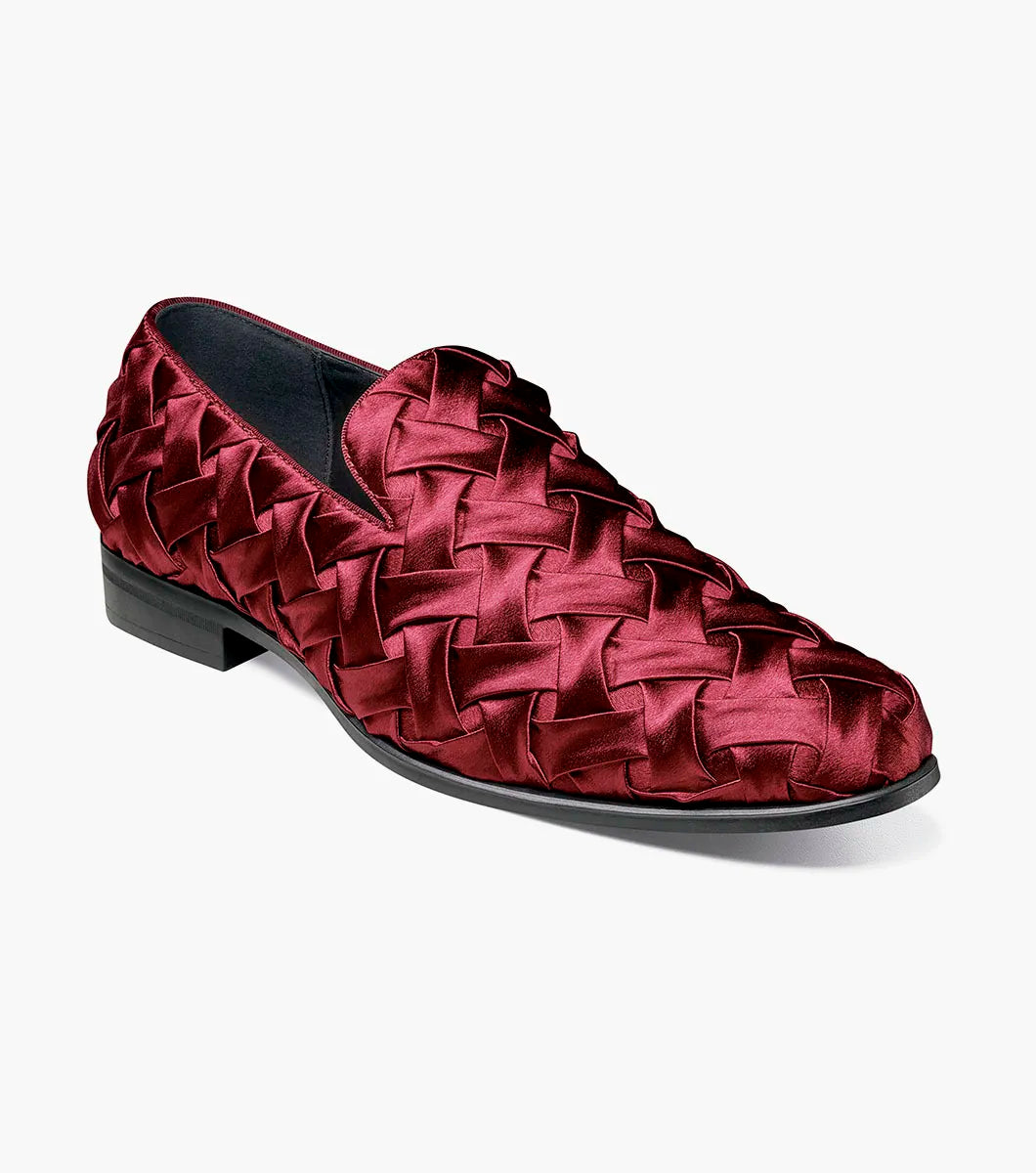 The Stacy Adams Savoir Plain Toe Satin Slip On in burgundy features a maroon finish, low black heel, and memory foam insole, shown on a white background.