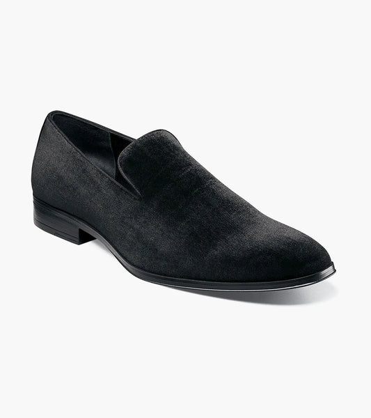 The STACY ADAMS Savian Plain Toe Velour Slip On in black (25613-001) is a black velvet loafer with a low heel, rounded toe, and memory foam footbed, shown on a plain white background.