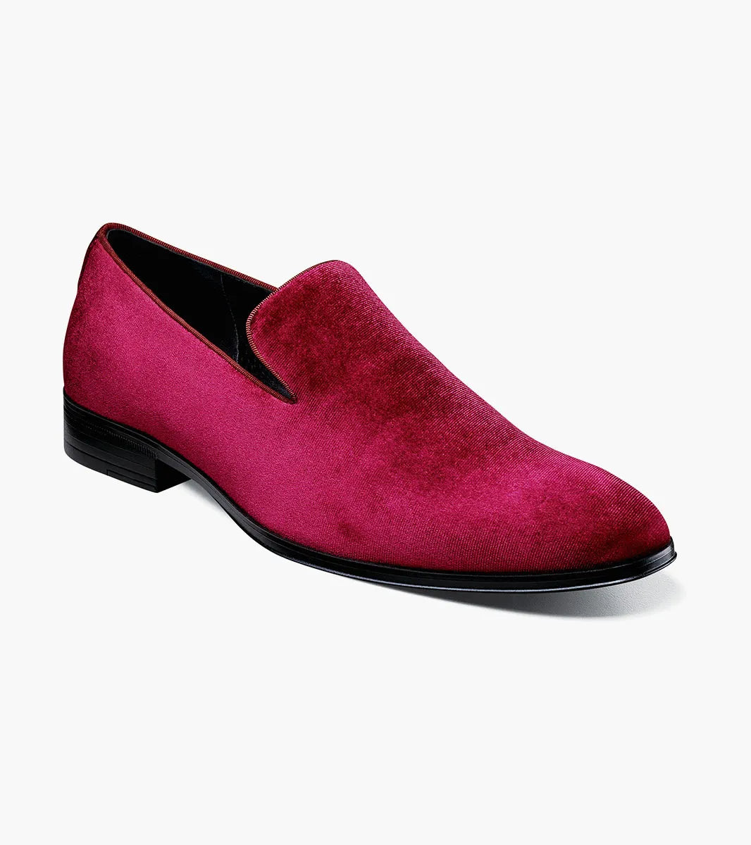The Stacy Adams Savian Plain Toe Velour Slip On in cranberry (25613-608) features a men’s rounded toe, cushioned insole, low black heel, and sleek magenta velour design, shown on a plain white background.