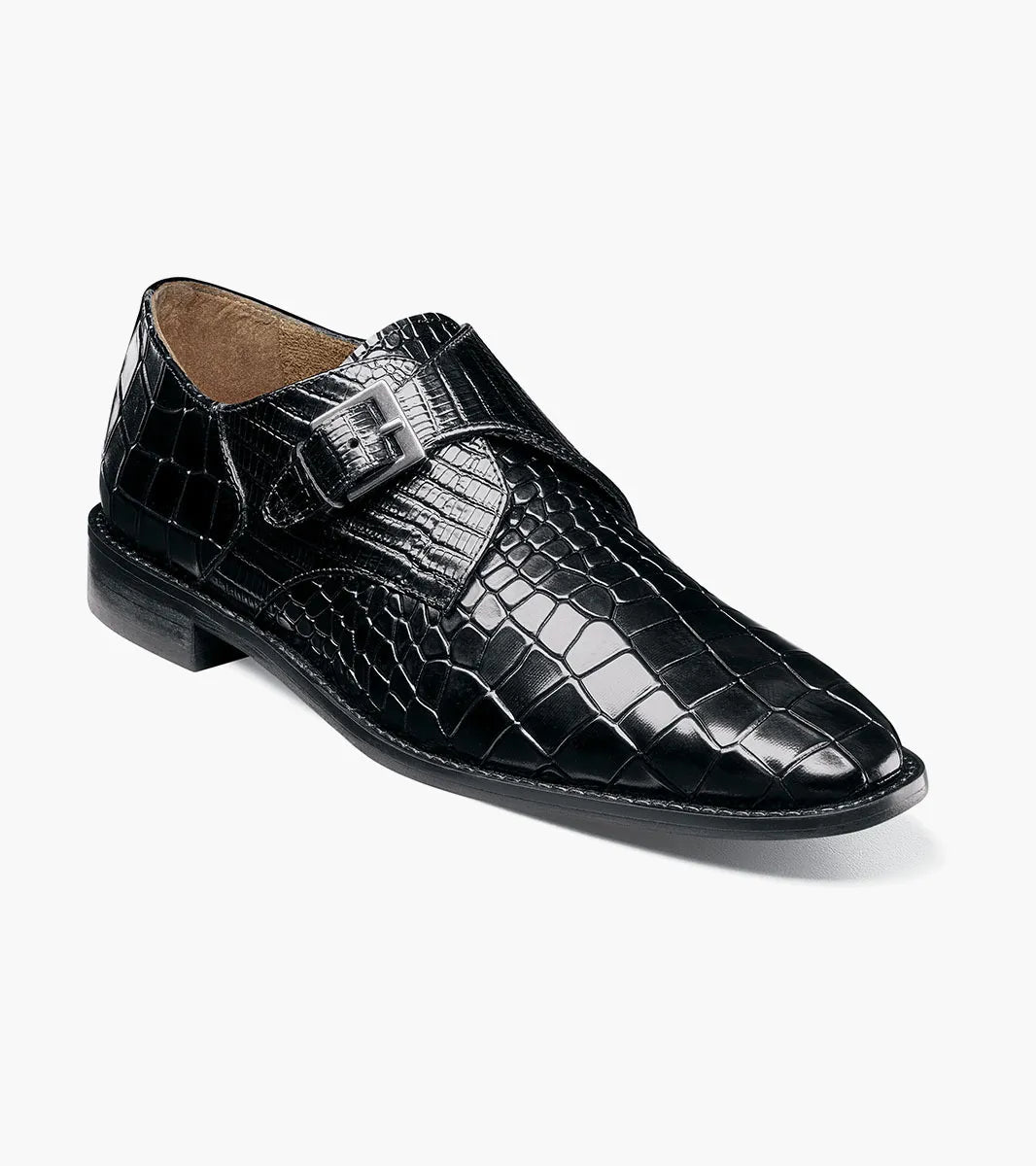 The Stacy Adams Rapino Plain Toe Monk Strap in black features crocodile print leather, a single monk strap with silver buckle, low heel, and RedZone footbed, shown on a white background.