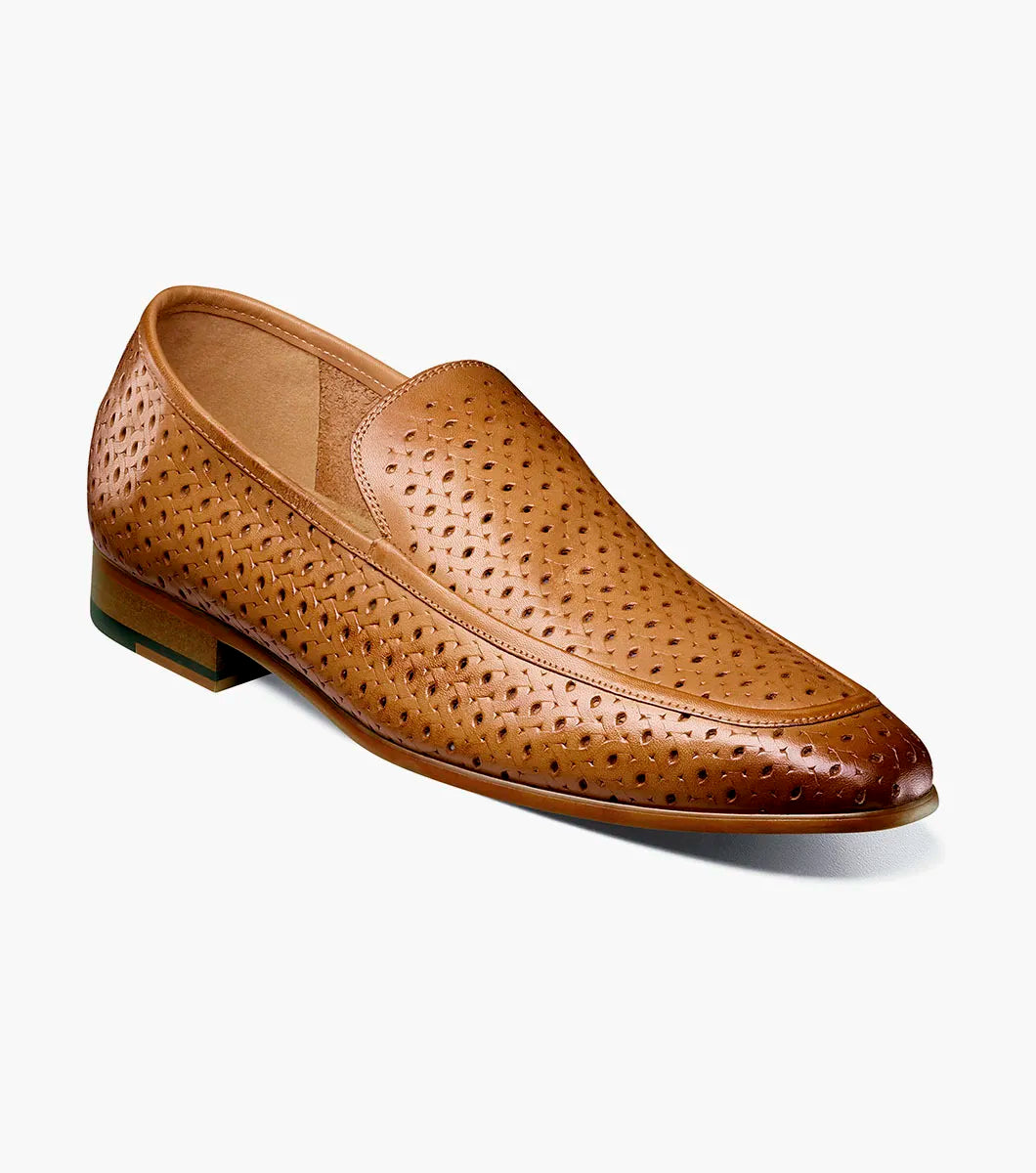 The STACY ADAMS Winden Moc Toe Perf Slip On in Natural (25645-280) is a men's summer shoe with perforations, memory foam insole, low stacked heel, and a sleek silhouette. Shown on a white background.