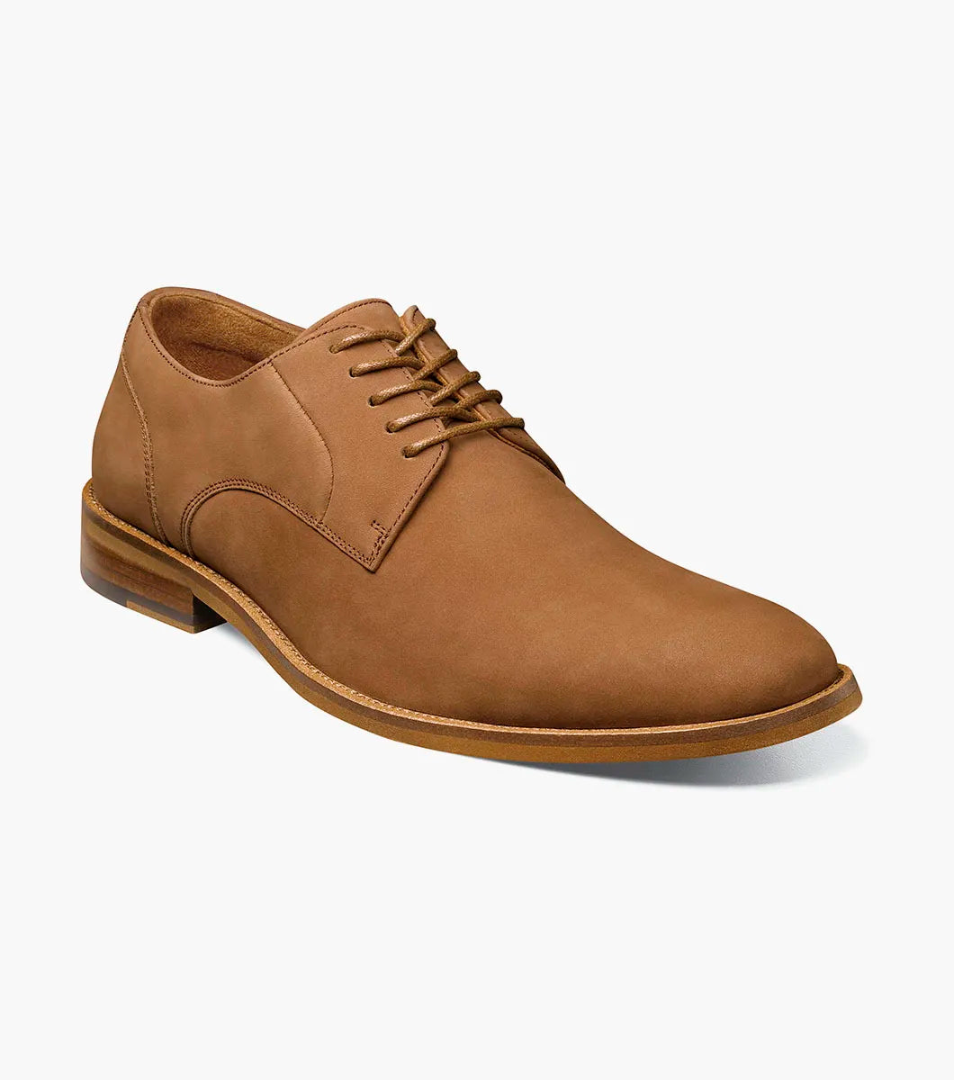 The STACY ADAMS Preston Plain Toe Lace Up in tan (25650-240) is a men’s dress shoe with a low heel and rounded toe, shown on a white background.