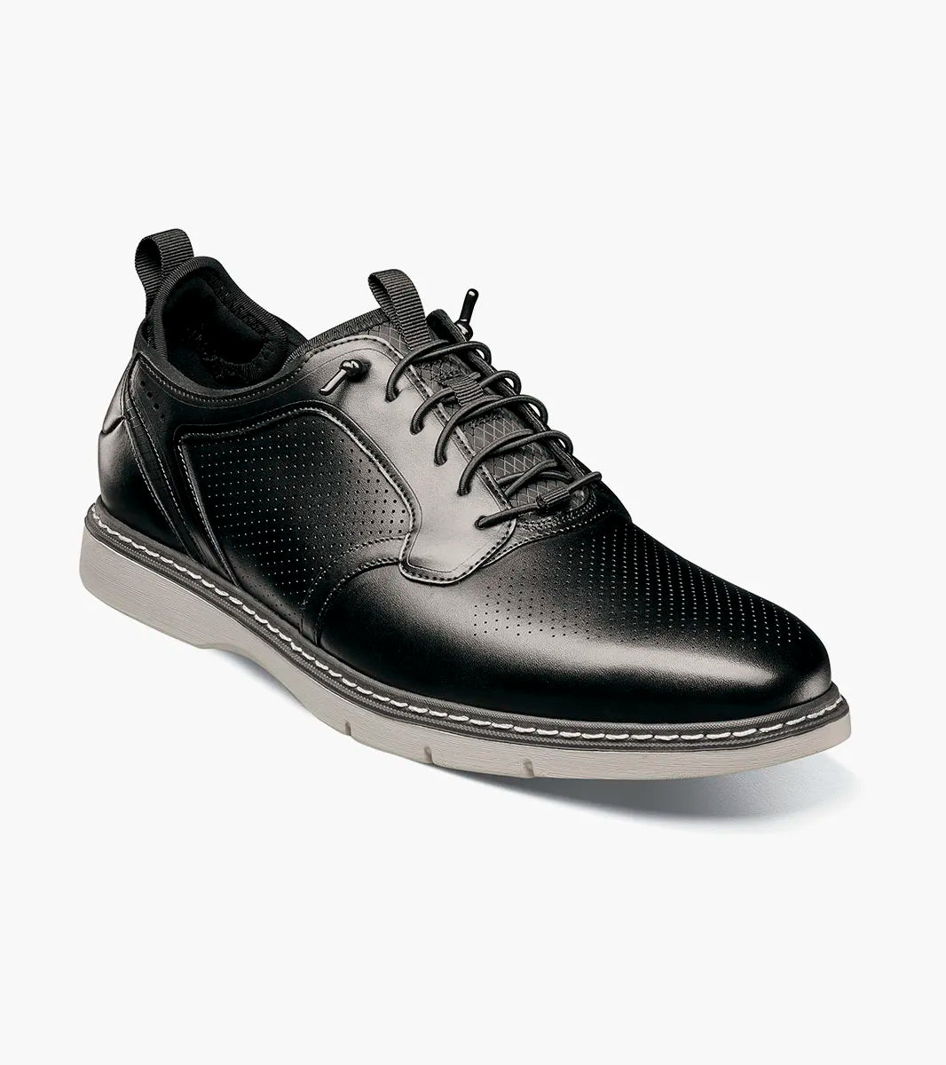 The Stacy Adams Sync Plain Toe Elastic Lace Up in Black (25662-001) features a molded heel cup, anatomical arch support, cushioned heel pod, and a soft velour insole for comfort; STACY ADAMS branding is visible.