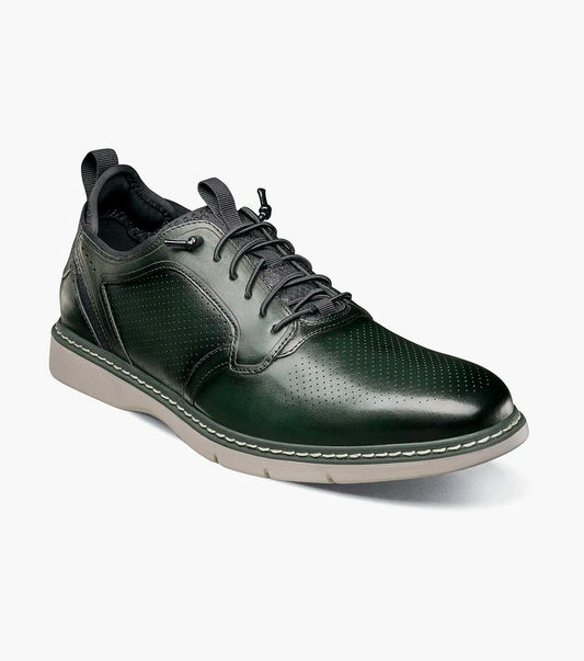 The STACY ADAMS Sync Plain Toe Elastic Lace Up in green (25662-300) features dark green leather, perforated detailing, black elastic laces, a RedZone footbed, and a light gray sole, shown on a white background.