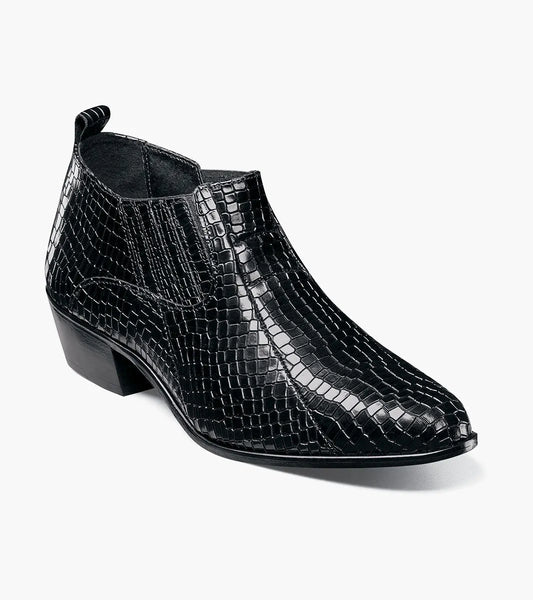 The Stacy Adams Sandoval Cuban Heeled Boot (25666-001) is a black ankle boot with a pointed toe, crocodile-printed leather pattern, low Cuban heel, and durable rubber outsole.