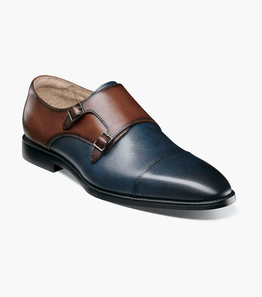 The STACY ADAMS Raythorne Cap Toe Double Monk Strap (Navy/Brown, 25671-414) is a men's leather dress shoe featuring a blue and brown upper, double monk buckles, a low black heel, and a rounded toe.