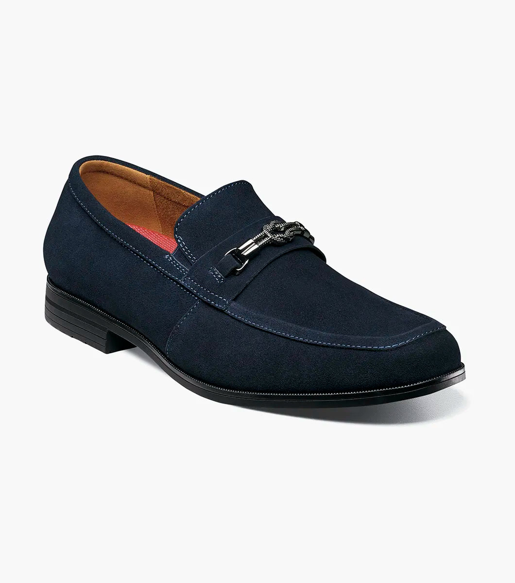 The STACY ADAMS Ravelle Moc Toe Bit Slip On in Navy Suede has an insole with a molded heel cup, anatomical arch support, and a cushioned footbed with a cushioned heel pod for ergonomic comfort.