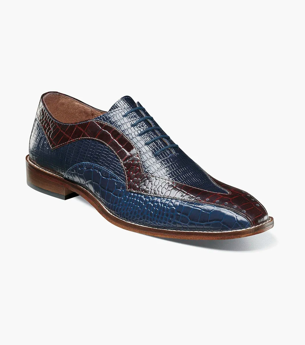 The Stacy Adams Tallero V-Tip Oxford (Dark Blue Multi, 25682-469) features a shoe insole with a molded heel cup, anatomical arch support, and cushioned heel pod to enhance comfort and highlight its supportive design.