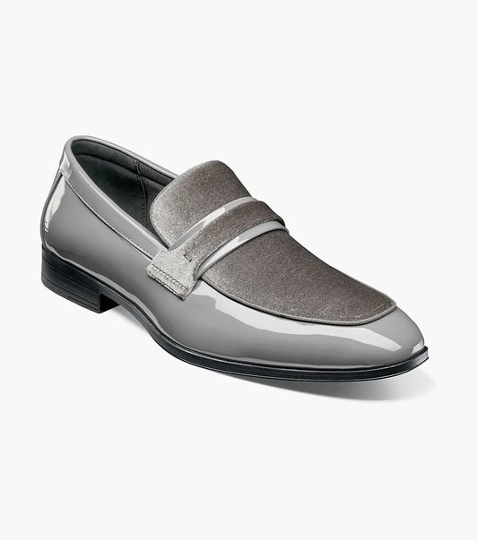 The STACY ADAMS Spratley Moc Toe Saddle Slip On in gray (25686-020) features a velour upper with a shiny patent finish, moc toe slip-on design, low heel, and rounded toe.