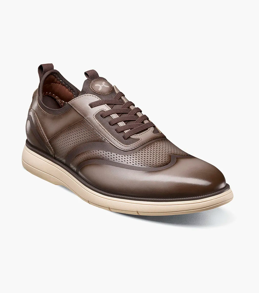 The Stacy Adams Edgewood Wingtip Elastic Lace Up features a cross-sectioned insole with molded heel cup, anatomical arch support, cushioned heel pod, and flex zone for superior comfort and stability.