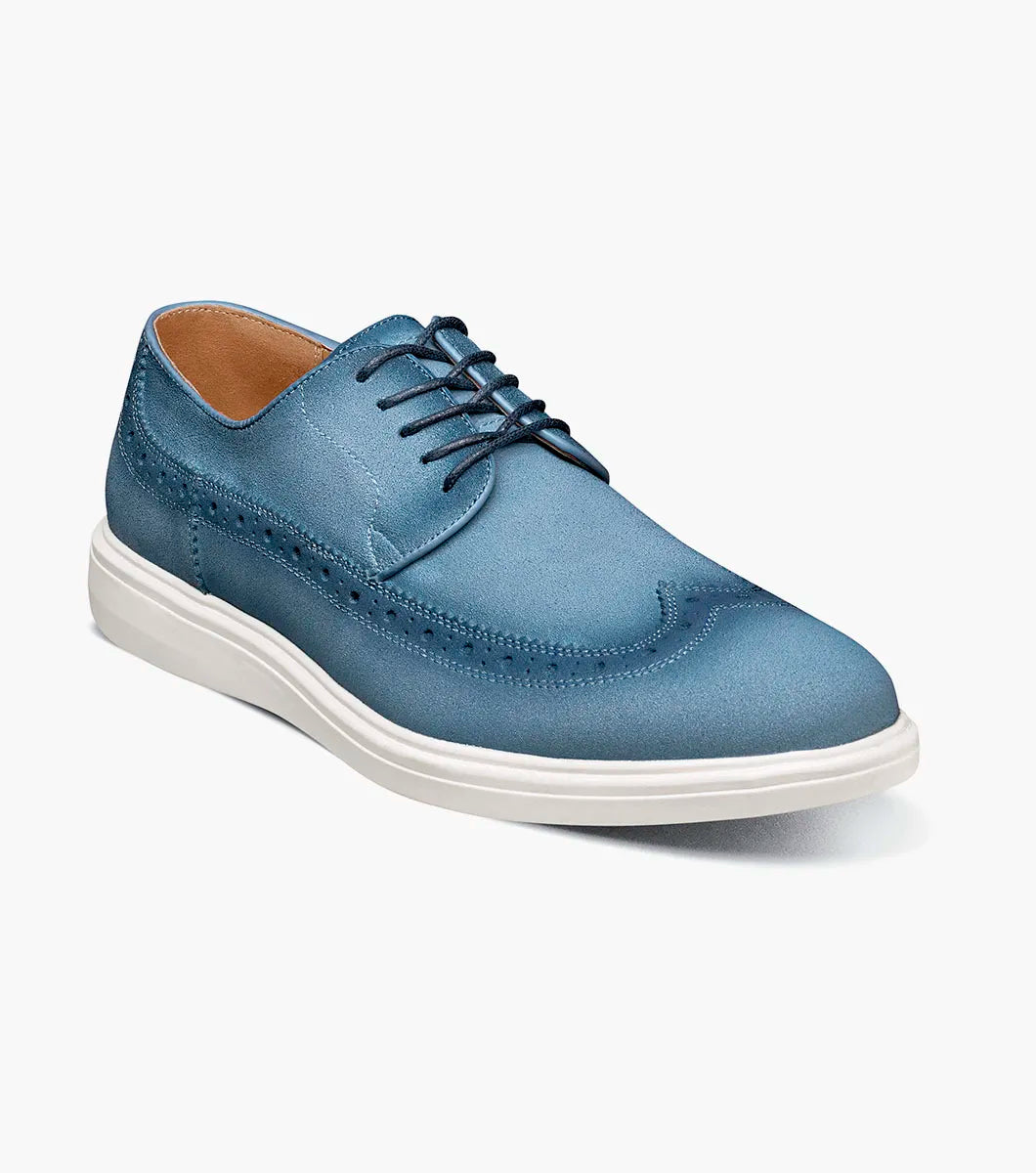 A single STACY ADAMS Trudell Wingtip Lace Up (Light Blue, 25691-459) suede oxford shoe with decorative stitching and a white rubber sole is displayed on a plain light background.