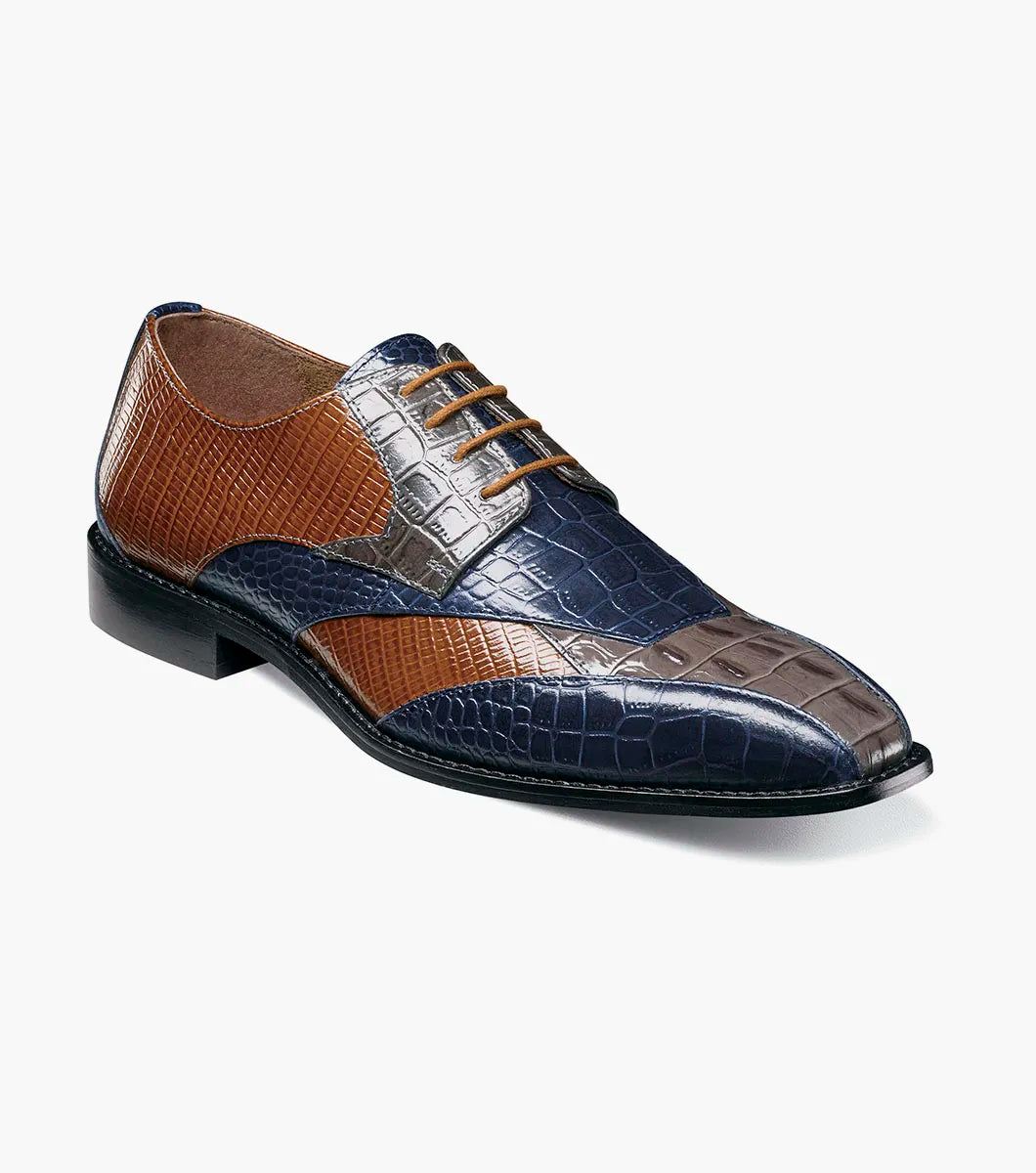 The STACY ADAMS Tristano Modified Bike Toe Oxford (Gray Multi) is a men's dress shoe with anatomical arch support and a sleek black sole, featuring gray multi-tone leather panels.