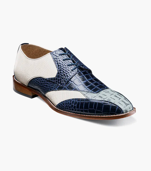 The Stacy Adams Tristano Modified Bike Toe Oxford in Dark Blue Multi features white leather, blue crocodile print leather, lace-up design, RedZone footbed, and a brown sole.