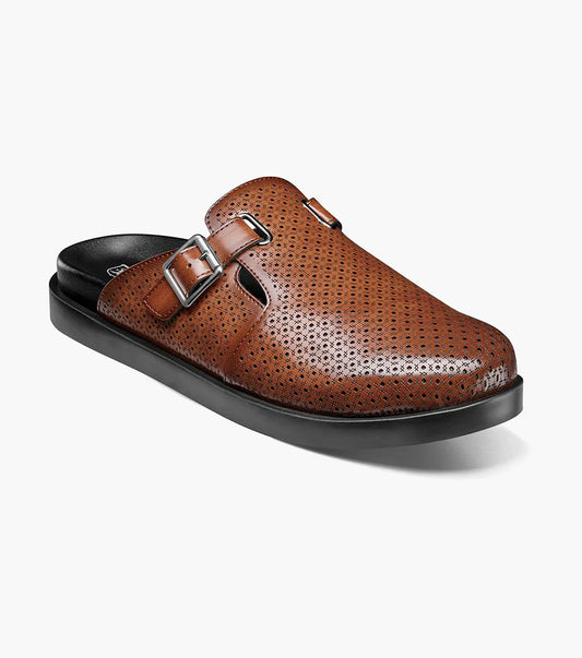 The STACY ADAMS Montaine Strap Sandal in Cognac (25696-221) features brown perforated leather, two side buckles, a black sole, and an EVA midsole—ideal for summer and shown on a white background.