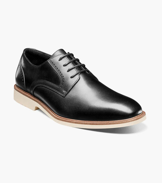 The STACY ADAMS Wescott Plain Toe Oxford (Black, 25712-001) is a black leather dress shoe with black laces, a light tan sole, and a low heel, shown on a white background.