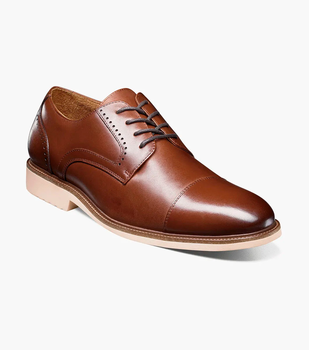 The Stacy Adams Wesbridge Cap Toe Oxford in chocolate features burnished leather, a tan sole, black laces, and anatomical arch support. Displayed on a white background. Brand: STACY ADAMS.