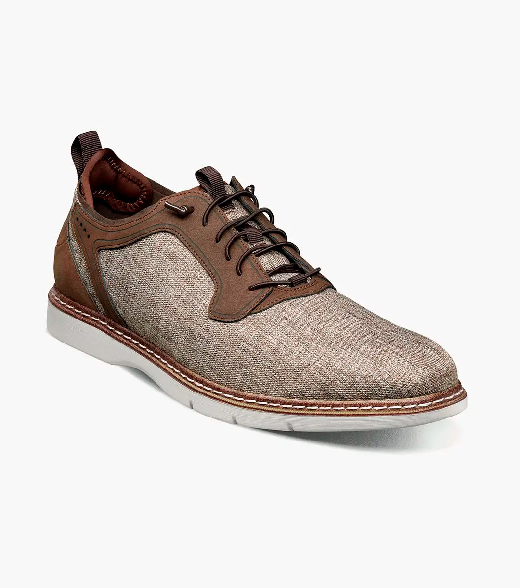 The STACY ADAMS Scanlan Plain Toe Elastic Lace Up in Brown Multi (25716-249) features a textured fabric upper, leather accents, Memory Foam footbed, and white rubber sole, shown in profile against a plain white background.
