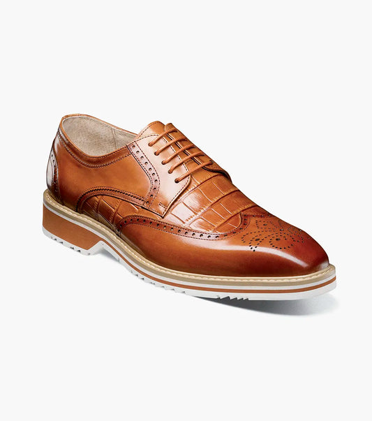 The Stacy Adams Beaumont Wingtip Oxford in tan (25723-240) features decorative stitching, brogue toe detailing, a light-colored sole, and soft leather linings for comfort.