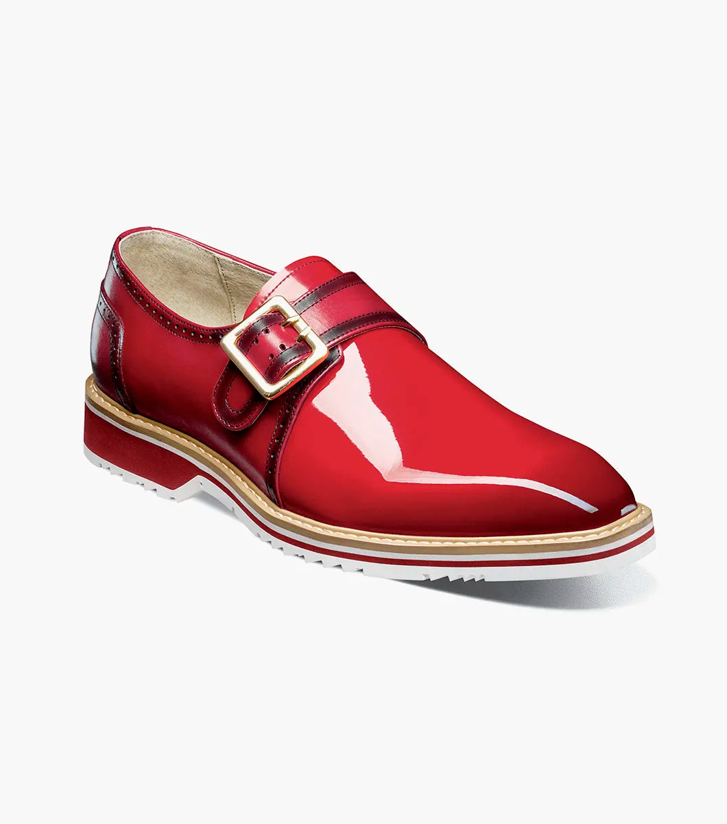 The Stacy Adams Bartram Plain Toe Monk Strap in red features a glossy patent upper, monk strap buckle, brown accents, and a white treaded sole for standout style.