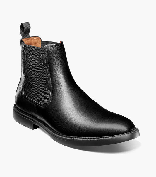 The STACY ADAMS Townsend Plain Toe Chelsea Boot (25728-007) in black tumbled leather features elastic side panels, a back pull tab, cushioned footbed, and low heel.
