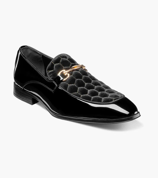 The STACY ADAMS Sprague Moc Toe Bit Slip On (Black, 25732-001) features a textured patent leather upper, gold metal bit detail, and low heel—ideal for elevating your dress shoe collection.