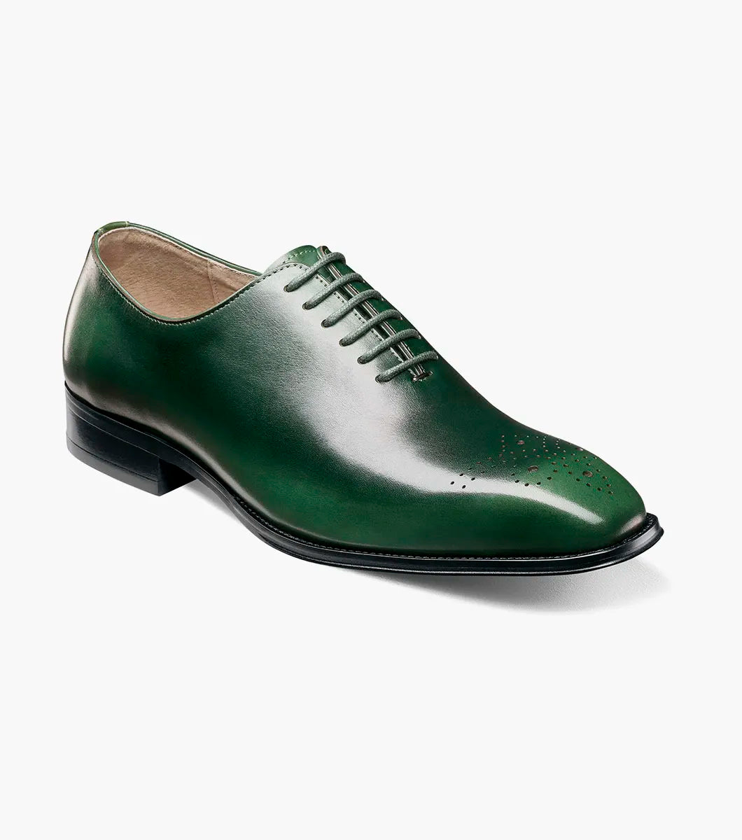 A single green STACY ADAMS Hallquist Plain Toe Oxford leather shoe (style 25742-300) with laces and decorative perforations on the toe, shown isolated on a white background.