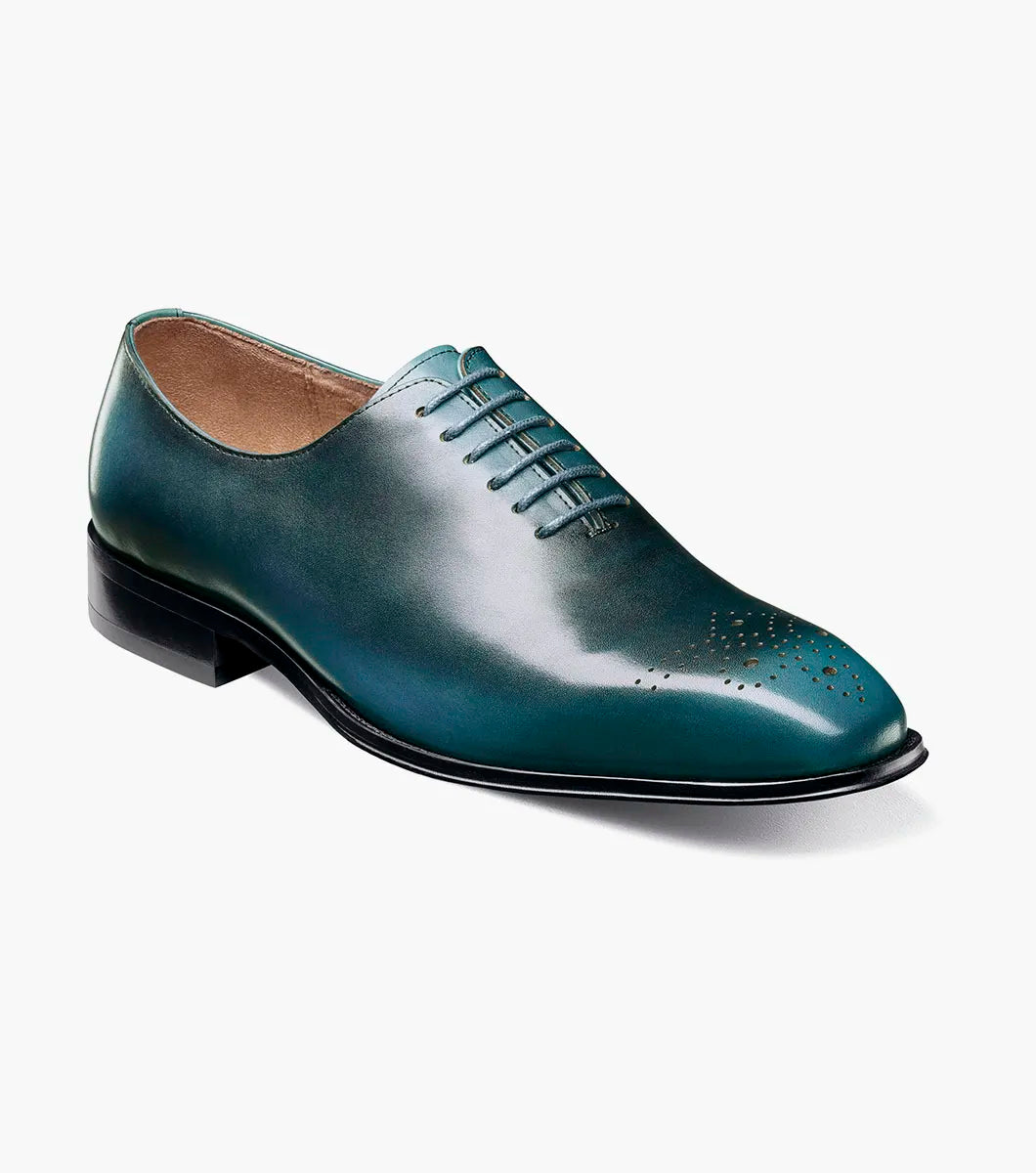 The Stacy Adams Hallquist Plain Toe Oxford in turquoise, featuring smooth leather, closed lacing, black sole, Memory Foam insole, and toe perforations, is shown on a white background.