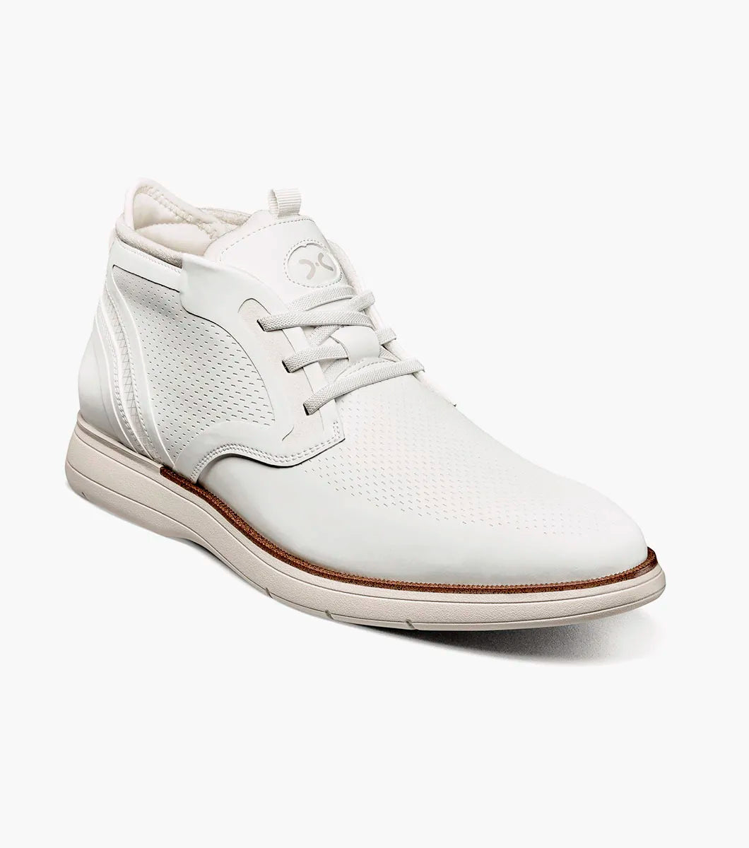 The STACY ADAMS Eastmont Plain Toe Elastic Lace Chukka Boot in white features a leather upper with perforations, subtle stitching, and a contrasting beige outsole, displayed on a white background.