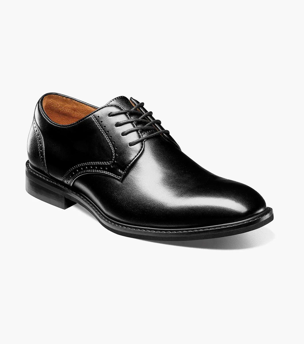 The STACY ADAMS Benson Plain Toe Oxford (Black, 25751-001) is a classic men's leather dress shoe with laces, low heel, and brown lining—ideal for those seeking comfortable, timeless style. Shown against a plain white background.