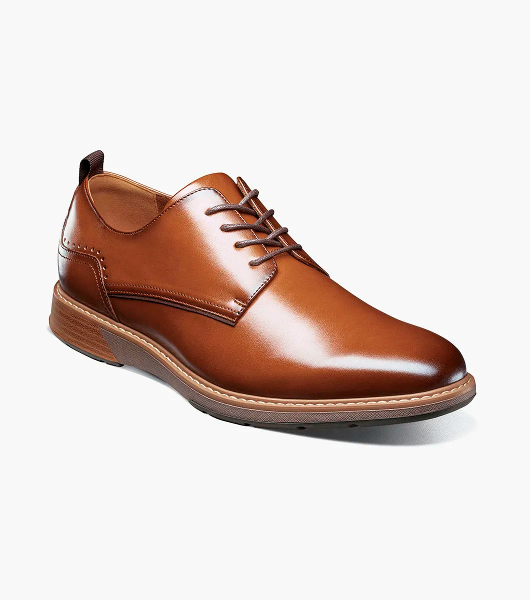 The Stacy Adams Pacer Plain Toe Oxford in Cognac (25754-221) is shown on a white background—its classic lace-up design and low heel make it ideal for both dress casual and formal occasions.