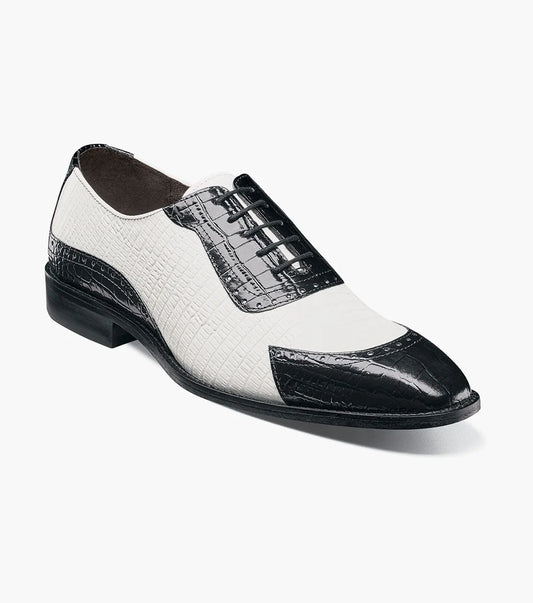 The STACY ADAMS Tarango Modified Cap Toe Oxford (Black w/White, 25770-111) is a men's lace-up dress shoe in crocodile print leather with a low heel, perfect for an elegant formal look.