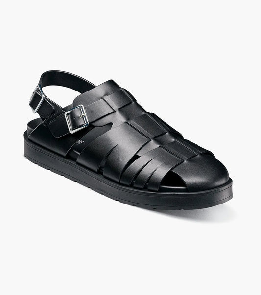 The Stacy Adams Largo Slingback Buckle Sandal (25773-001) features black leather woven straps, an open toe, closed heel, cushioned sole, and adjustable buckles—perfect men’s summer footwear. Shown on a white background.