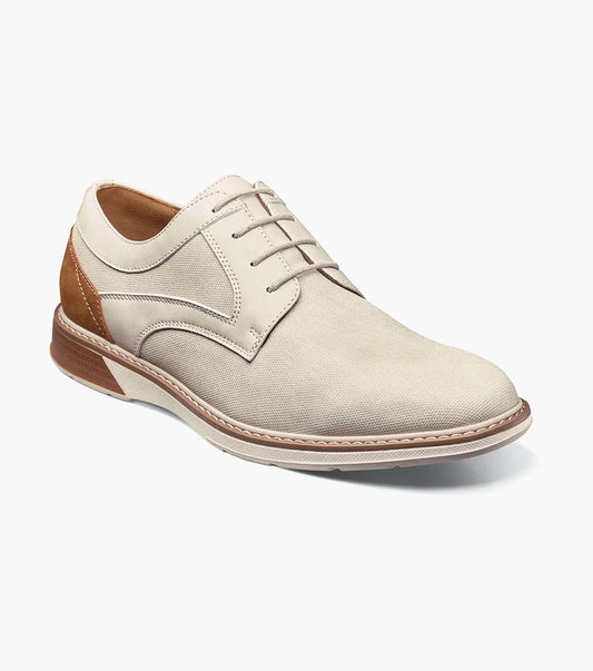The Stacy Adams Phineas Plain Toe Oxford in sand features a stylish upper, tan leather heel accent, cushioned insole, and brown sole, shown against a plain white background.