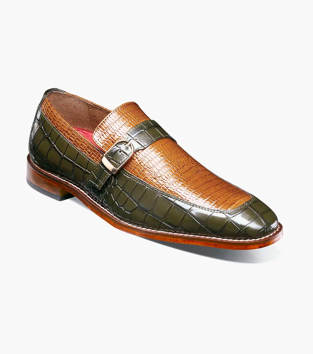 Here’s a rewritten version of the sentence using your product data: The Stacy Adams Rubiano Moc Toe Buckle Strap Slip On in Olive Multi features a brown textured upper, dark green crocodile print leather sides, a small silver buckle, and a reddish-brown sole. This STACY ADAMS men’s loafer is designed with a cushioned footbed for added comfort.